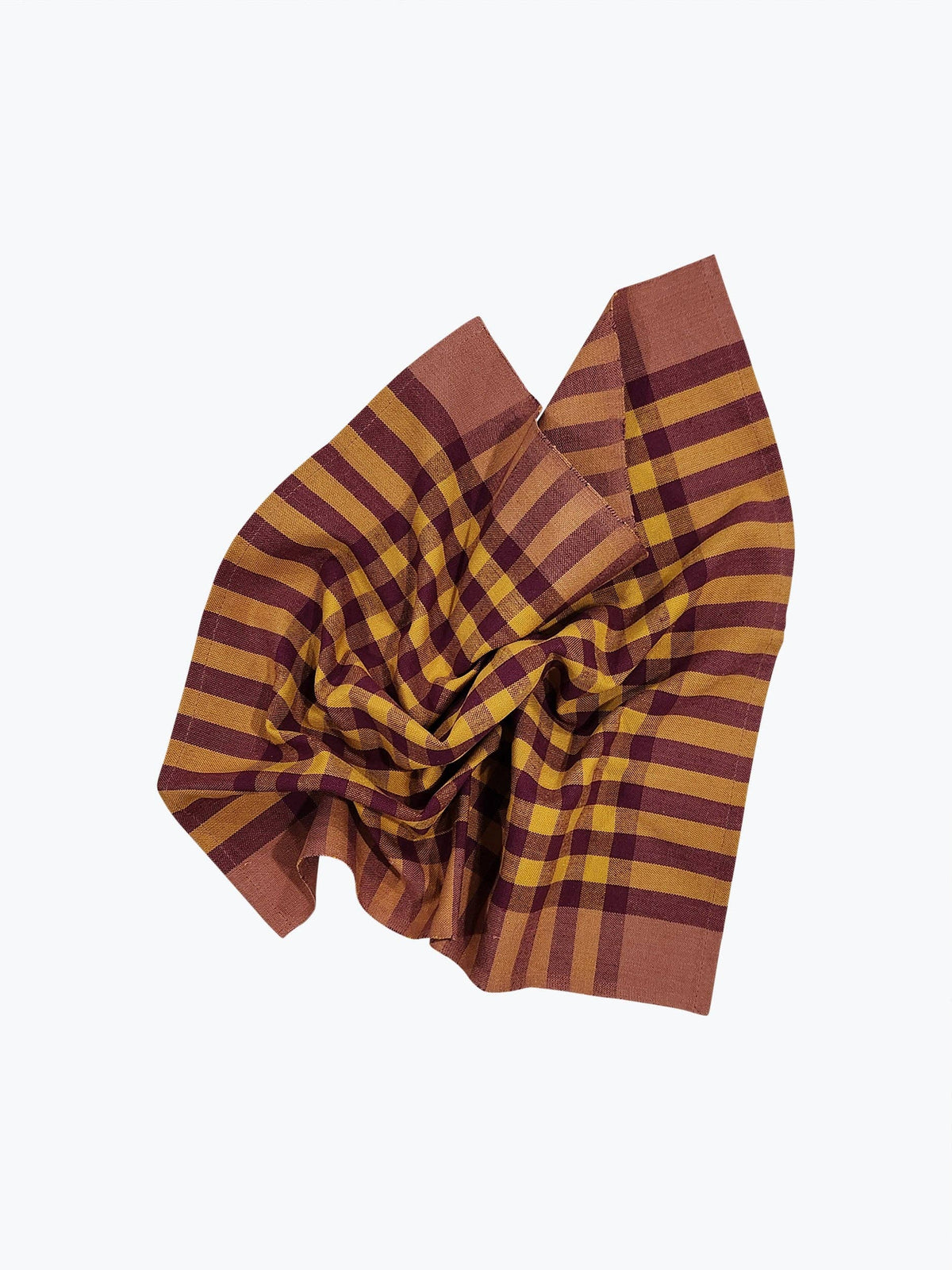A handwoven plaid napkin with brown and yellow pattern on a white background.