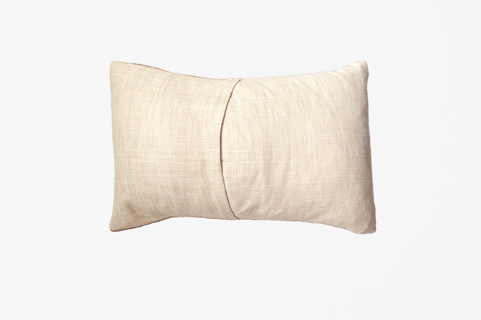 A rectangular lumbar pillow in a textured beige linen fabric, featuring a central vertical seam, shown against a plain white background.