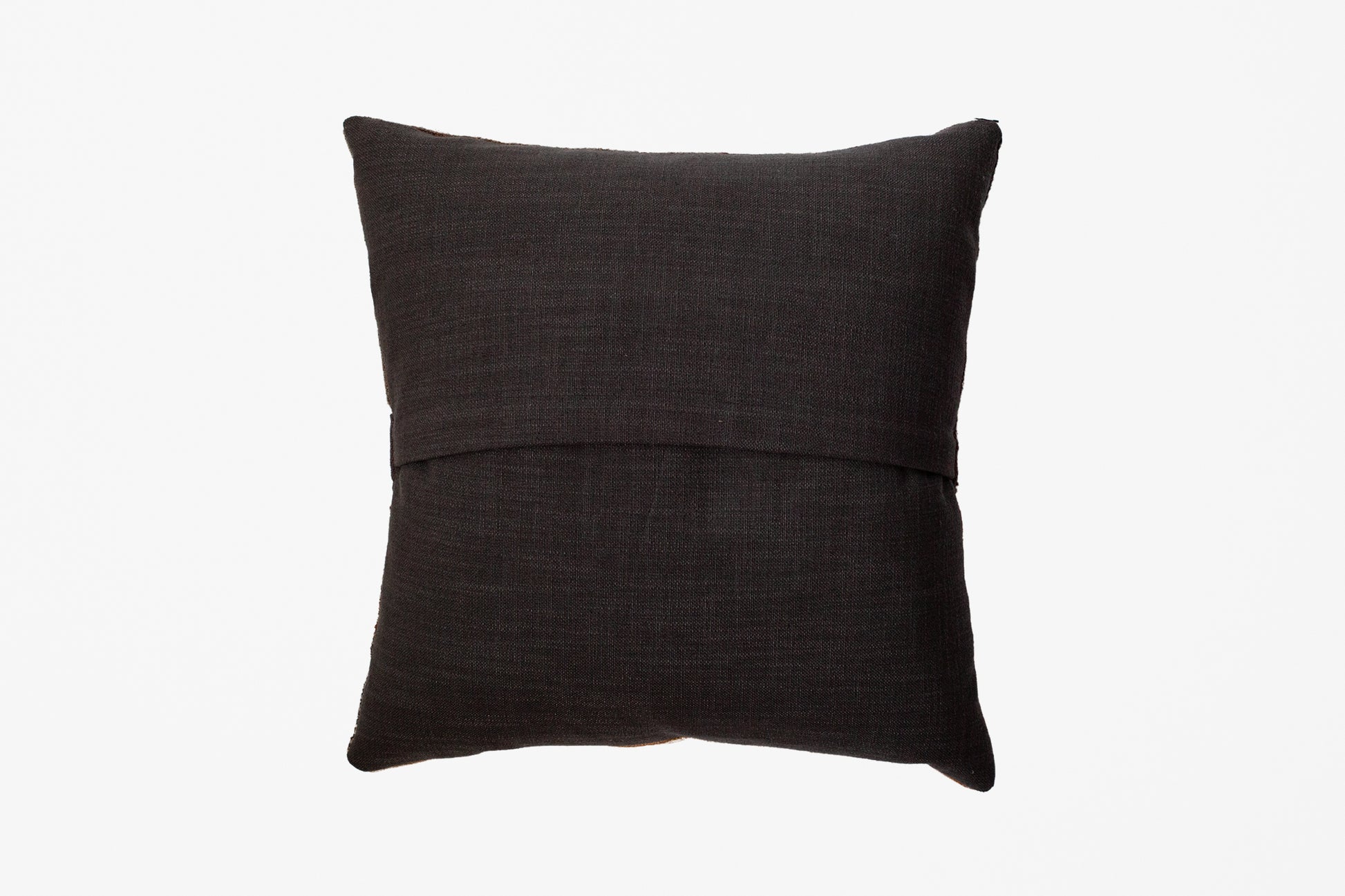 A textured linen backing of a square dark brown pillow with a horizontal stitched seam across the middle, shown against a plain white background.