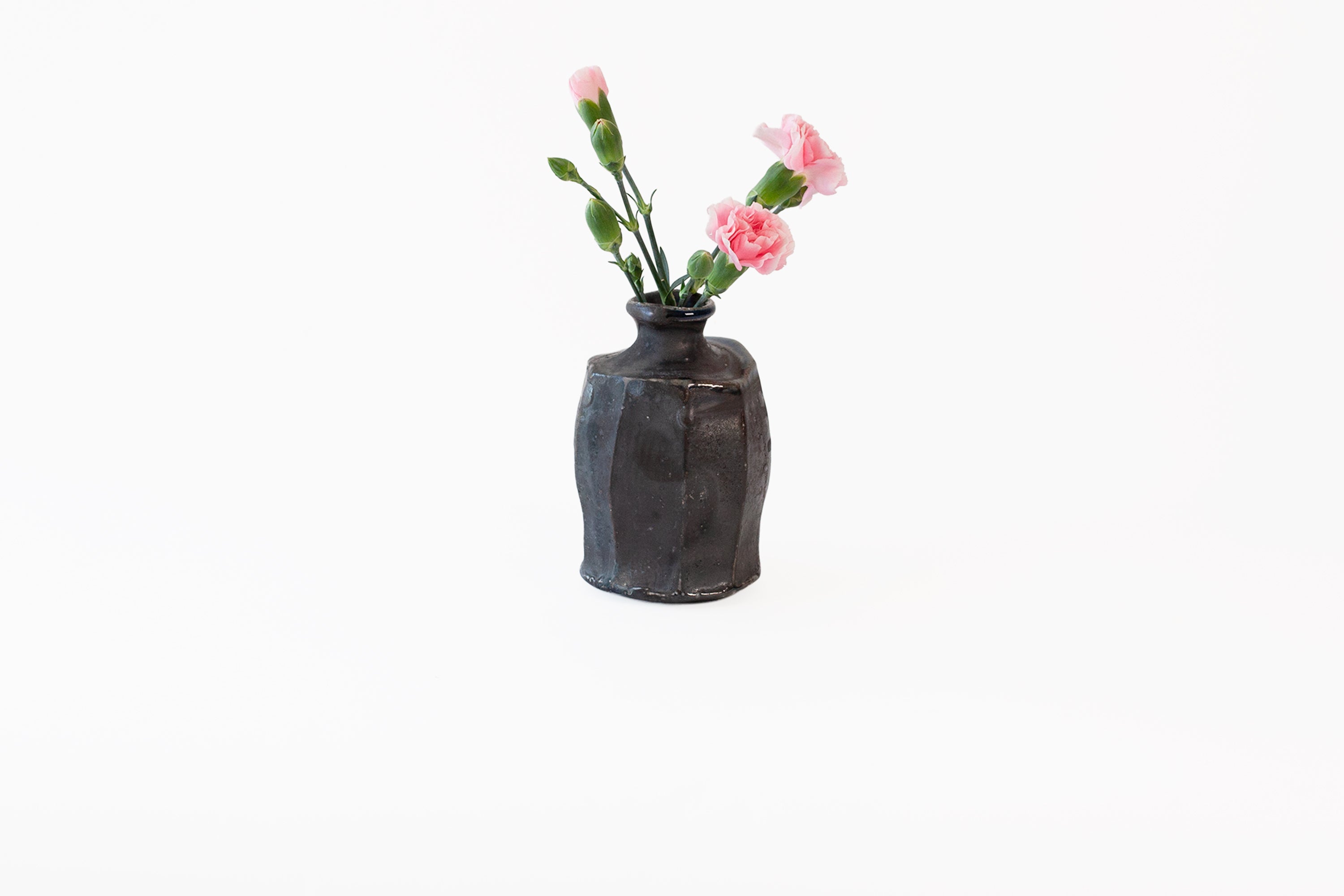 Soda-Fired Faceted Bottle