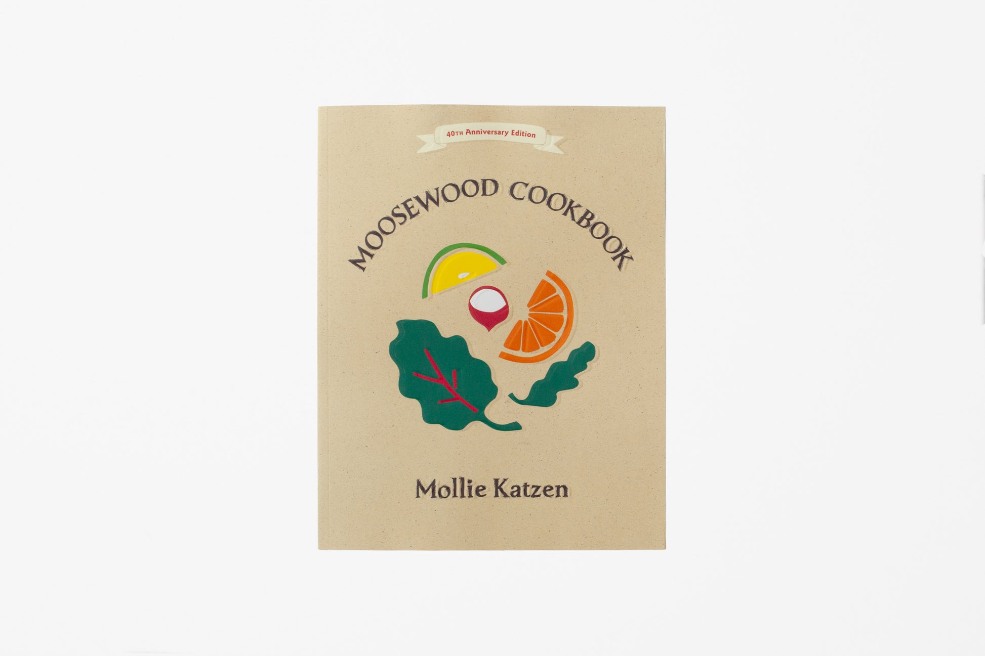 The front cover of the 'Moosewood Cookbook' by Mollie Katzen, featuring a light beige background with a colorful illustration of fresh ingredients (leaves, radish, lime, carrot, orange) and a small 'Our Farmhouse Kitchen' banner at the top.