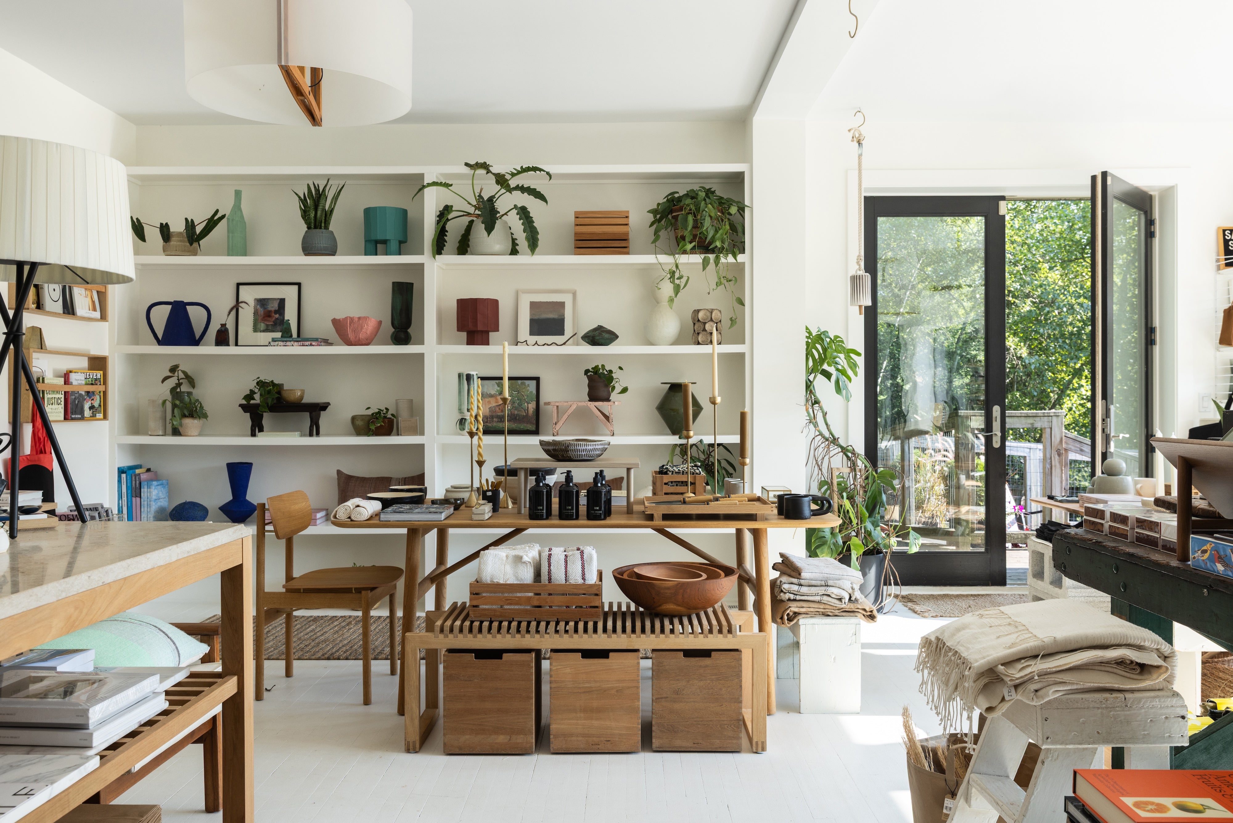 Modern living room with wooden furniture and white walls